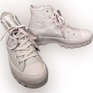 Converse Chuck Taylor Lug Sole High Top Sneakers.